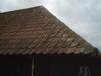 Replace ridge tiles on tractor shed
