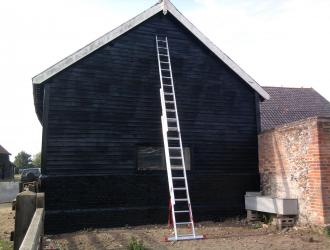 Paint end of barn in Brandeston